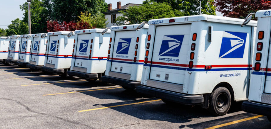 USPS vans are ready to receive bulk mail marketing postage